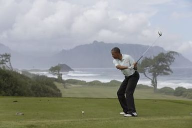 Barack Obama plays golf with Prime Minister Najib Razak, Joe Paulsen, and Mike Brush in Kaneohe Bay, Hawaii, December 24, 2014