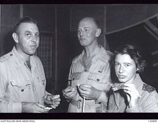 RABAUL, NEW BRITAIN. 1945-12-28. THE PRIME MINISTER OF AUSTRALIA, MR BEN CHIFLEY, ARRIVED BY PLANE TO VISIT MANY OF THE UNITS IN THE AREA. SOME OF THE GUESTS AT THE SISTERS' MESS AT 118TH ..