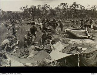 Port Moresby, New Guinea. 1944-01-05. Main marshalling area for the 15th Australian Infantry Brigade near Jackson's Drome during the change over with the 25th Australian Infantry Brigade. At this ..