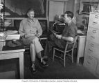 Col. Stafford L. Warren and Capt. Robert Buettner aboard the ship U.S.S. HAVEN, 1947
