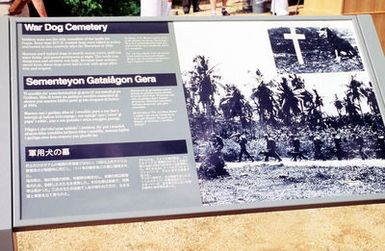 A historical marker identifying the significance of the War Dogs. Photograph was taken during the 50TH Anniversary Ceremony of the Liberation of Guam WWII