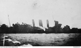 SOLOMON ISLANDS, 1942-08-09. HMAS CANBERRA JUST BEFORE SINKING IN THE BATTLE OF SAVO ISLAND. (DONOR: A.L. ROSE)