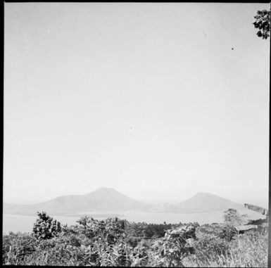 View across the harbour to Mother and South Daughter Mountains, Rabaul Harbour, New Guinea, 1937 / Sarah Chinnery