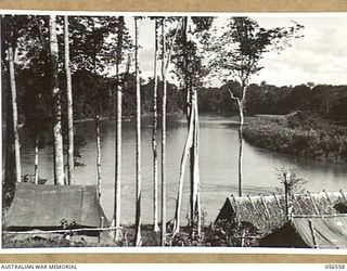 LAKEKAMU RIVER, NEW GUINEA, 1943-09-06. VIEW FROM THE CAMP AREA OF THE 41ST AUSTRALIAN WATER TRANSPORT COMPANY AT GRIM POINT. THIS POINT IS THE CHIEF UNLOADING POINT ON THE RIVER