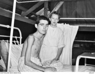 JACQUINOT BAY, NEW BRITAIN. 1945-09-08. PRIVATE J.B. KEPCHIA, AVIATION RADIO MAN, USAAF, FROM PENNSYLVANIA, AN ALLIED PRISONER PICKED UP AT RABAUL AFTER THE JAPANESE SURRENDER AND BROUGHT TO ..