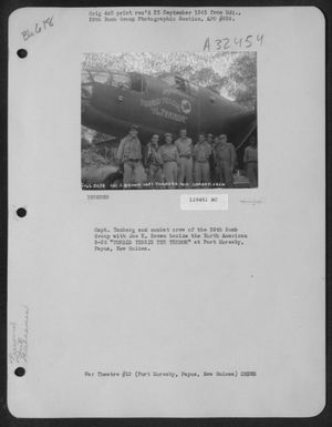 Capt. Tanberg And Combat Crew Of The 38Th Bomb Group With Joe E. Brown Beside The North American B-25 'Torrid Tessie The Terror' At Port Moresby, Papua, New Guinea. (U.S. Air Force Number 119451AC)