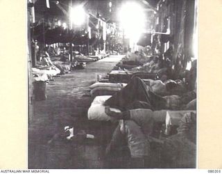 THE INTERIOR OF THE MAIN HOSPITAL WARD AT THE 2/11TH GENERAL HOSPITAL, AUSTRALIAN ARMY MEDICAL CORPS