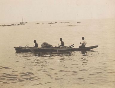 Three men in a canoe. From the album: Photographs of Apia, Samoa