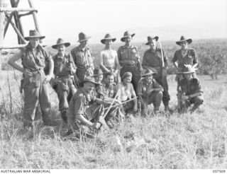 KAIAPIT, NEW GUINEA, 1943-09-22. INFORMAL GROUP PORTRAIT OF OFFICERS OF THE 2/6TH AUSTRALIAN INDEPENDENT COMPANY