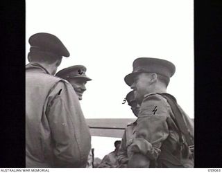 7 MILE, NEW GUINEA. 1943-11-01. THE ARRIVAL OF THE FIRST PARTY OF THE UNITED KINGDOM LETHBRIDGE MILITARY MISSION AT WARDS 'DROME. LEFT TO RIGHT: LIEUTENANT COLONEL (LT COL) R. B. READHEAD (1); LT ..