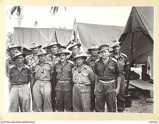 BORAM BEACH, WEWAK AREA, NEW GUINEA. 1945-08-31. SENIOR OFFICERS OF 2/15 FIELD AMBULANCE, WITH THEIR COMMANDING OFFICER LIEUTENANT COLONEL A.C. MENDELSOHN (3)