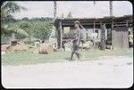 Woman walking with child