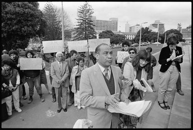 Puni Raea presents a petition to Labour's spokesperson on justice, Frank O'Flynn