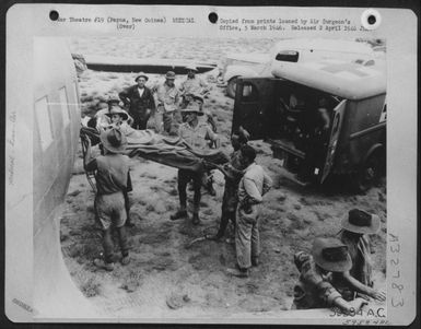 Air Evacuation at Base D, Port Moresby, Papua, New Guinea, December 1942. (U.S. Air Force Number 59584AC)