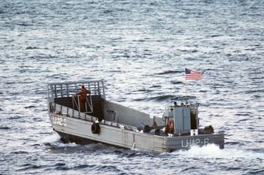 A port quarter view of an LCM 6 mechanized landing craft from the amphibious assault ship USS SAIPAN (LHA 2) underway during NATO Exercise NORTHERN WEDDING 86