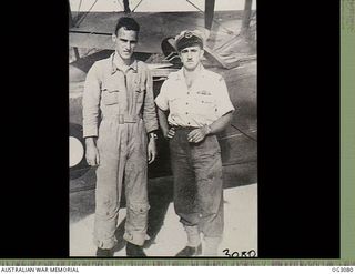 TADJI, NORTH EAST NEW GUINEA. C. 1945-06. THE RESCUED AND THE RESCUER. LIEUTENANT (LT) J. P. CARTER (LEFT) WITH FLYING OFFICER AGNEW STANDING BESIDE THE SUPERMARINE WALRUS AMPHIBIAN AIRCRAFT WHICH ..