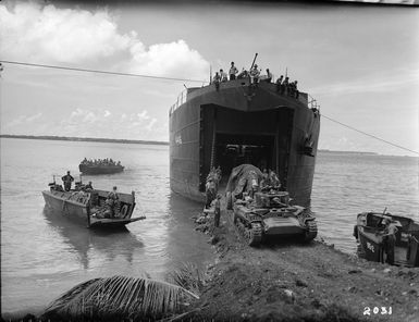 World War II vehicles, equipment, and troops landing on Nissan Island, Papua New Guinea