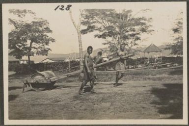 Papuan men working on a road, New Britain Island, Papua New Guinea, approximately 1916