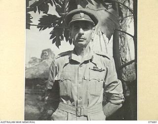 LAE, NEW GUINEA. 1944-09-08. BRIGADIER G. COVELL, CONSULTING MALARIOLOGIST TO GENERAL HEADQUARTERS, INDIA, DURING A VISIT OF INSPECTION TO NEW GUINEA