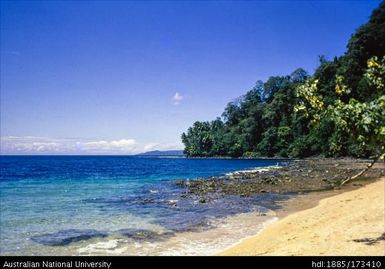 Rakival beach looking South East across the break in the coral towards Natir Point and Tavui Point on the mainland