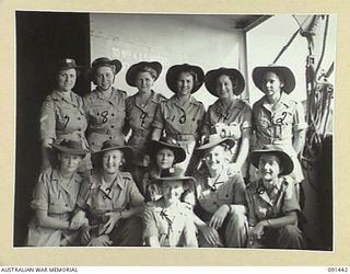 LAE, NEW GUINEA, 1945-05-07. AUSTRALIAN WOMEN'S ARMY SERVICE PERSONNEL AWAITING DISEMBARKATION ABOARD THE MV DUNTROON, ANCHORED OFF MILFORD HAVEN. THEY ARE EN ROUTE TO THE AUSTRALIAN WOMEN'S ARMY ..