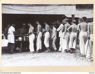 BOUGAINVILLE, 1945-06-18. WALKING PATIENTS AT 109 CASUALTY CLEARING STATION, MOTUPENA POINT, ON MESS PARADE