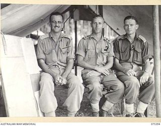 MILILAT, NEW GUINEA. 1944-08-15. OFFICERS OF THE COMMAND GROUP SIGNALS, HEADQUARTERS, 5TH DIVISION. IDENTIFIED PERSONNEL ARE:- QX40790 CAPTAIN N.J. GREGG, ADJUTANT (1); VX150 LIEUTENANT-COLONEL ..