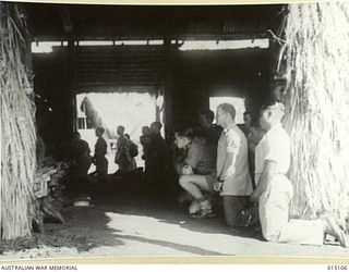 1943-06-25. NEW GUINEA. ST PATRICK'S ROMAN CATHOLIC CHURCH. FIRST MASS IS CELEBRATED IN THE NEW CHURCH. (NEGATIVE BY N. BROWN)