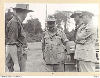BOUGAINVILLE. 1945-06-08. GENERAL SIR THOMAS A. BLAMEY, COMMANDER-IN-CHIEF, ALLIED LAND FORCES, SOUTH WEST PACIFIC AREA (2) AND SENIOR OFFICERS FOLLOOWING THE INSPECTION OF 7 INFANTRY BRIGADE AT ..