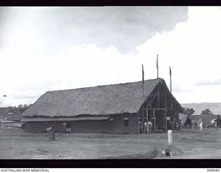 RABAUL, NEW BRITAIN, 1946-03-29. THE KUO-MIN-TANG HALL WHERE ASSEMBLIES ARE HELD AND ADMINISTRATION PROBLEMS SOLVED BY TOWN OFFICIALS AND AUSTRALIAN NEW GUINEA ADMINISTRATIVE UNIT (ANGAU) ..