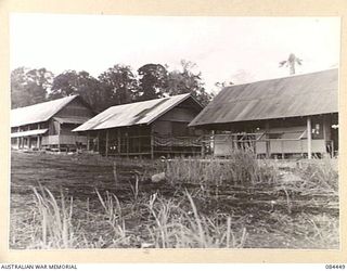 LAE, NEW GUINEA. 1944-12-21. THE ORDERLY ROOM, THE Q STORE, THE CANTEEN AND THE MEN'S MESS AT UNTHANK MILL OPERATED BY 2/3 FORESTRY COY MEMBERS