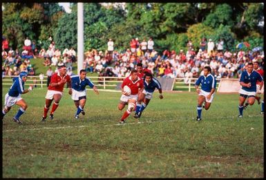 Tongan national rugby league team playing another team,Tonga