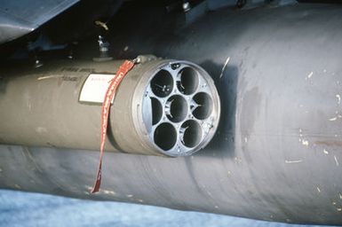 Close-up view of a rocket launcher pod attached to an OV-10 Bronco aircraft assigned to the 22nd Tactical Air Support Squadron