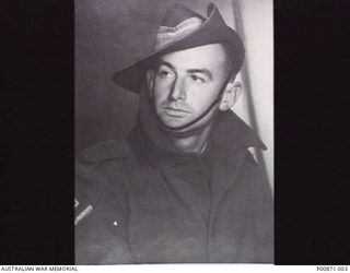 PORTRAIT OF NX169503 PRIVATE NORMAN LESLIE GOMM, 2/23RD INFANTRY BATTALION, WOUNDED AT SATTELBERG 1943-11-24 AND REPORTED AS HAVING DIED AS A PRISONER OF WAR (POW) C. 1943-11-30 AGED 19. HERE HE IS ..