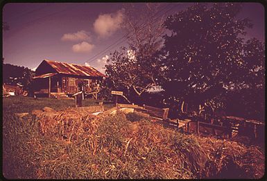 HOUSE IN RURAL DISTRICT ALONG HIGHWAY 36 NEAR HANA. RURAL DISTRICTS ARE COMPOSED OF LOW DENSITY RESIDENTIAL LOTS OF ONE BUILDING PER HALF ACRE