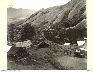 RAMU VALLEY, NEW GUINEA, 1944-03-07. RAMU VALLEY FROM THE SITE OF HEADQUARTERS, 15TH INFANTRY BRIGADE WITH ADMINISTRATIVE OFFICES IN THE FOREGROUND