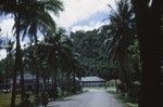 During a visit in Pago Pago the capital of American Samoa this photo was taken by a member of the Capricorn Expedition (1952-1953). Note the fale building in the center of the town square. 1953