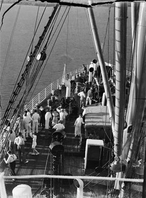 [People on the foredeck of a cruise ship]