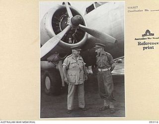 WEWAK AREA, NEW GUINEA, 1945-06-14. GENERAL SIR THOMAS A. BLAMEY, COMMANDER-IN-CHIEF,ALLIED LAND FORCES, SOUTH WEST PACIFIC AREA (1) AND MAJ-GEN J.E.S. STEVENS, GOC 6 DIVISION (2), STANDING IN ..