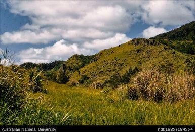 Okapa road - 14 miles to Orona, rock (right)