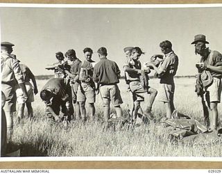 FORBES, AUSTRALIA. 1943-02. "GUINEA PIGS" TAKING PART IN A GAS SHELL SHOOT CARRIED OUT BY 2/2 FIELD REGIMENT, ROYAL AUSTRALIAN ARTILLERY AND 2/1 AUSTRALIAN CHEMICAL WARFARE LABORATORY, MARKING ..