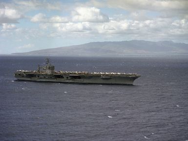 Aerial starboard side view of the nuclear-powered aircraft carrier USS CARL VINSON (CVN 70) underway near Pearl Harbor, Hawaii