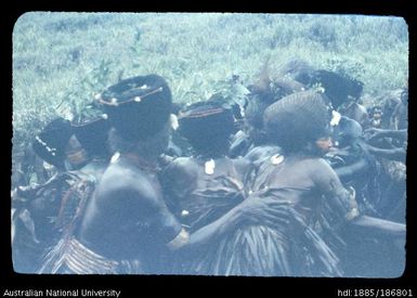 Group of Mendi people huddled together