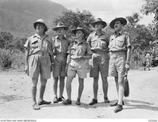PORT MORESBY, PAPUA. 1942-07. THE GENERAL OFFICER COMMANDING NEW GUINEA FORCE, MAJOR GENERAL B.M. MORRIS (EXTREME RIGHT), WITH SOME OF THE OFFICERS OF HIS STAFF, LEFT TO RIGHT:- LIEUTENANT COLONEL ..