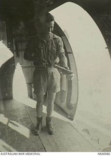 Probably Townsville, Qld. Interior of a Douglas C47 transport aircraft being sprayed by Leading Aircraftman E. Williamson of Brisbane, Qld, after a flight from New Guinea. Probably at No. 36 ..