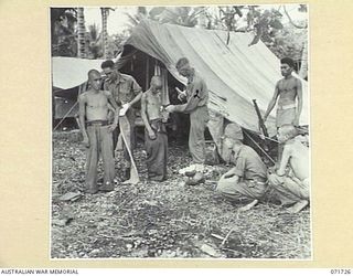 WASU, PAPUA, 1944-03-25. MEDICAL TREATMENT BEING GIVEN AT HEADQUARTERS PAPUAN INFANTRY BATTALION BY MEMBERS OF THE 2/5TH FIELD AMBULANCE TO JAPANESE PRISONERS OF WAR CAPTURED BY A PAPUAN INFANTRY ..