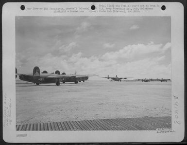 Consolidated B-24 Liberators Of The 11Th Bomb Group, Warming Up Motors Prior To Take Off On Mission From Kwajalein, Marshall Islands, July 1944. (U.S. Air Force Number 63804AC)