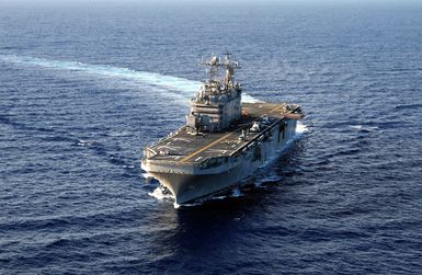 The US Navy (USN) Tarawa Class Amphibious Assault Ship USS TARAWA (LHA 1) underway in the Pacific Ocean. The TARAWA is taking part in Rim of the Pacific (RIMPAC) 2004. RIMPAC is the largest international maritime exercise in the waters around the Hawaiian Islands. This years exercise includes seven participating nations; Australia, Canada, Chile, Japan, South Korea, the United Kingdom and the United States. RIMPAC enhances the tactical proficiency of participating units in a wide array of combined operations at sea, while enhancing stability in the Pacific Rim region