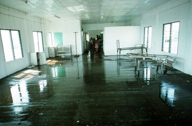 Water covers a hospital ward floor in the village of Tuasivi in the aftermath of Cyclone Ofa which struck the islands of Upolu and Savaii. U.S. military personnel and military from other nations are providing disaster relief efforts in the area