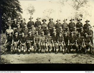 Torokina, Bougainville. 1945-11. Group portrait of 2 Field Survey Company, No. 1 and No. 3 Sections, Detached. Left to right: back row: Sergeant (Sgt) R. Watson, Sapper (Spr) B. Bartley, Spr J. ..